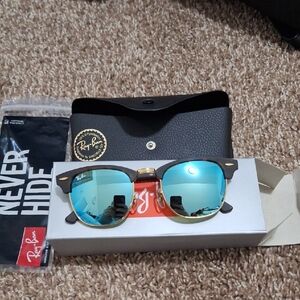 Ray-Ban Black and Gold Sunglasses with Blue Lenses